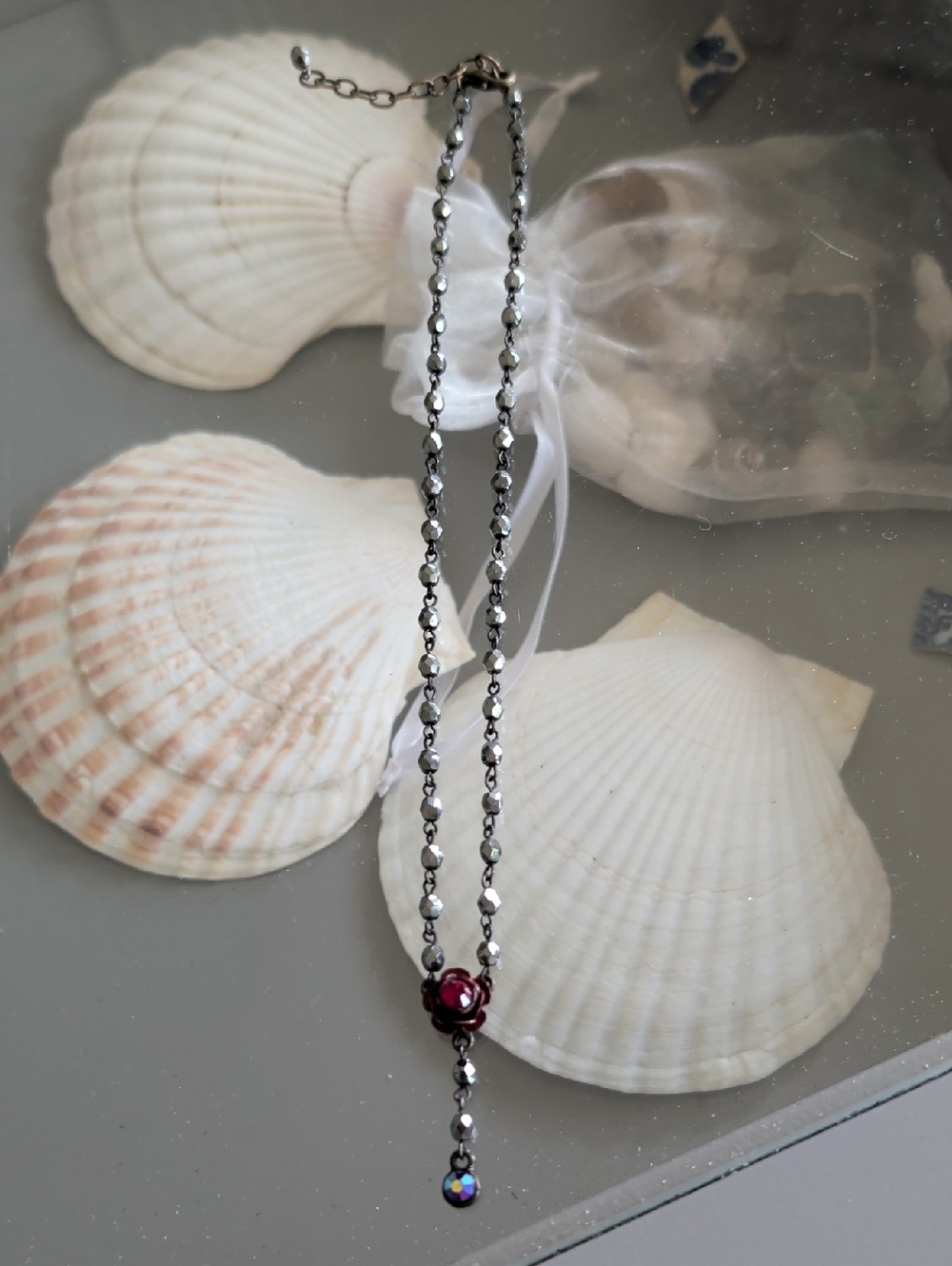 Elegant Silver-Tone Necklace with Red Gem Pendant